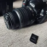 Nikon D3100 с объективом 18–55 мм VR 2