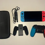 Nintendo Switch OLED с док-станцией, геймпадом, играми 2
