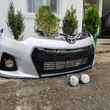 Передний бампер Toyota Corolla 2014 Sport с решёткой и ПТФ 2