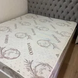 Кровать с мягким изголовьем и матрасом 160×200 см 1