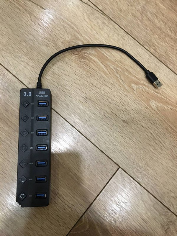 USB hub, spatula, rubber hammer, adapter, drill bits, cable, remote 5