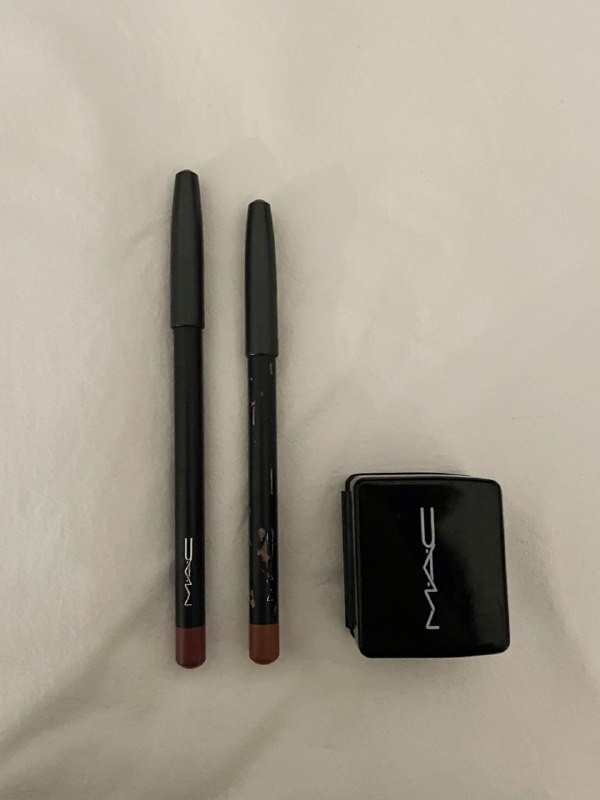 Glossier Perfecting Skin Tint, Body Shop lipstick, bronzer brush, La Roche-Posay balm, MAC pencils 9