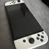 Nintendo Switch OLED с джойконами, чехлом, игрой 2