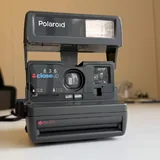 Письменный стол, зеркало, видеосвет Godox SL200II, опоры, кондиционер, глюкофон, барные стулья, дерби COS, кроссовки Nike Dunk Low, камера Polaroid 636 10