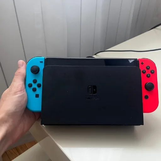 Nintendo Switch OLED с док-станцией, геймпадом, играми