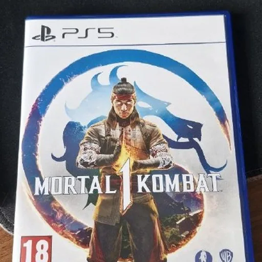 Диски Mortal Kombat 1, Spider-Man 2 для PS5
