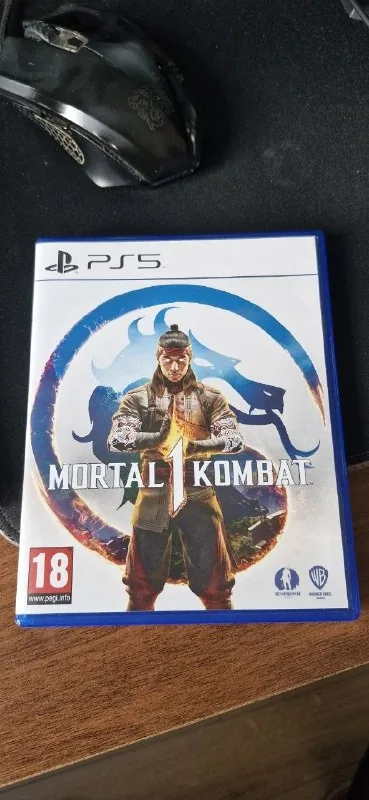 Диски Mortal Kombat 1, Spider-Man 2 для PS5 1