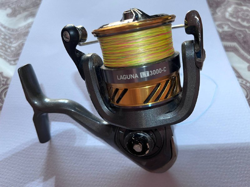 Воблеры, блесна, крючки и катушка 2