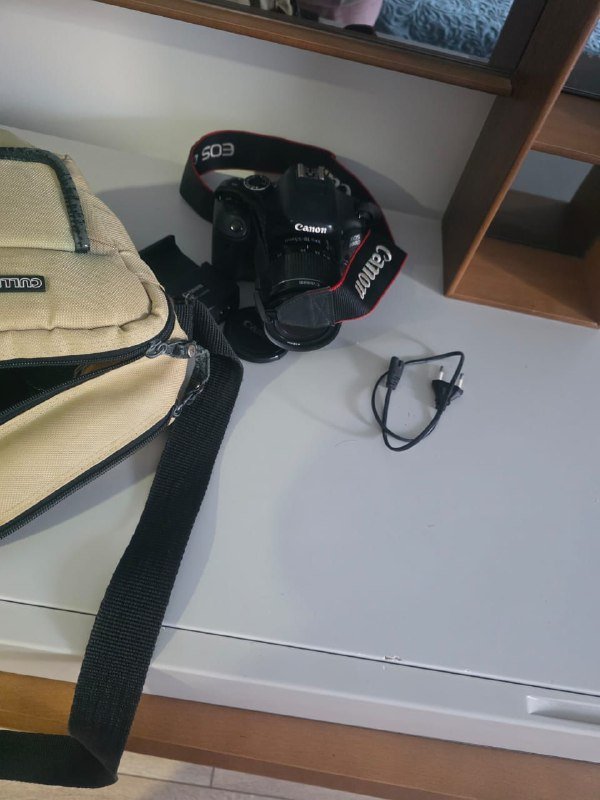 Фотоаппарат Canon с объективом и зарядным устройством 4