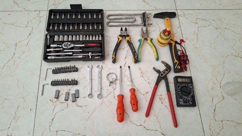 Набор инструментов с мультиметром и запчастями для стиральной машины