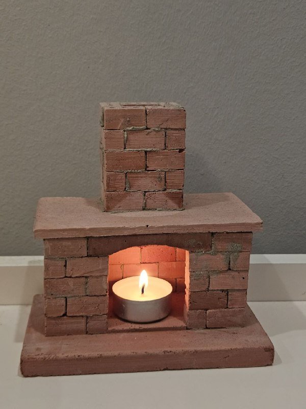 Декоративный мини-камин подсвечник
