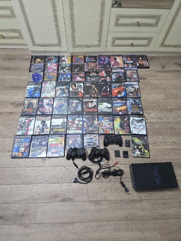 Sony PlayStation 2 с играми и аксессуарами 2