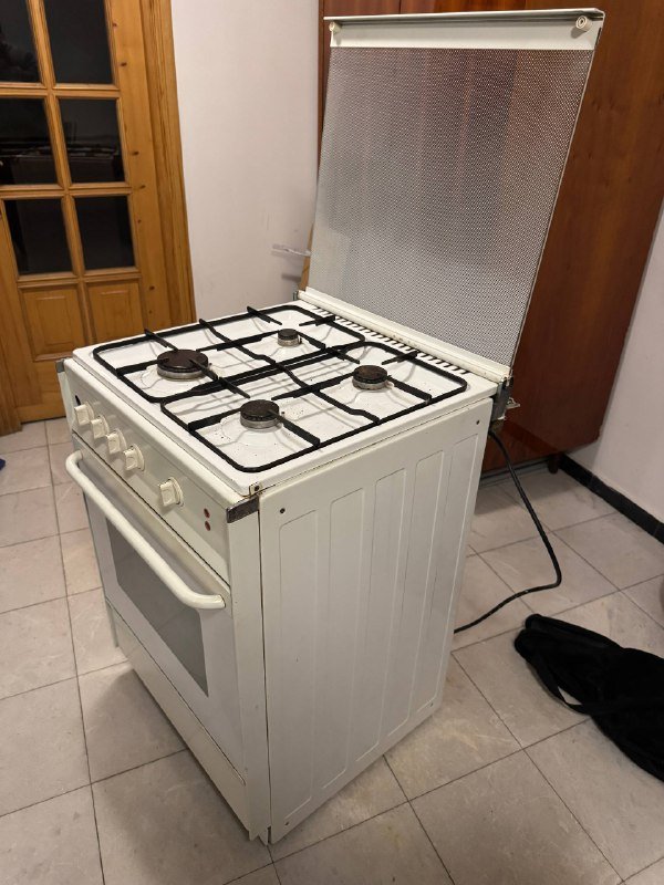 Комбинированная газовая плита с электрической духовкой