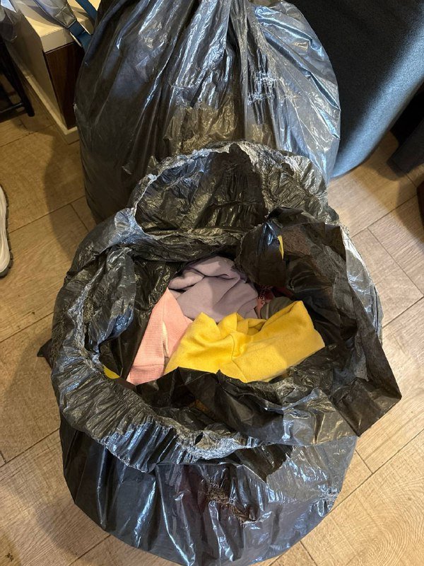 Одежда для детей и взрослых в мешках