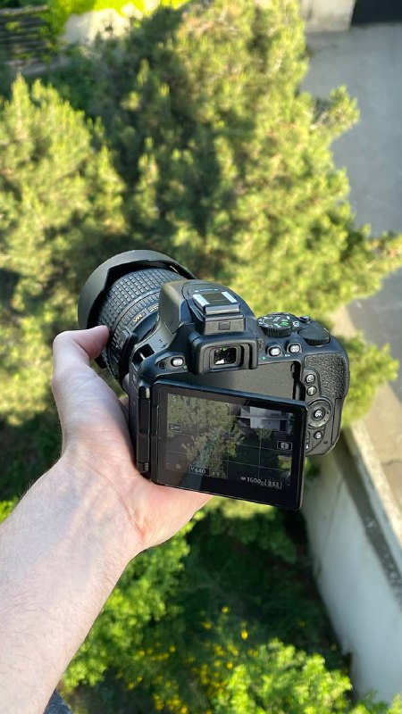 Nikon D5500 DSLR camera with lens and accessories