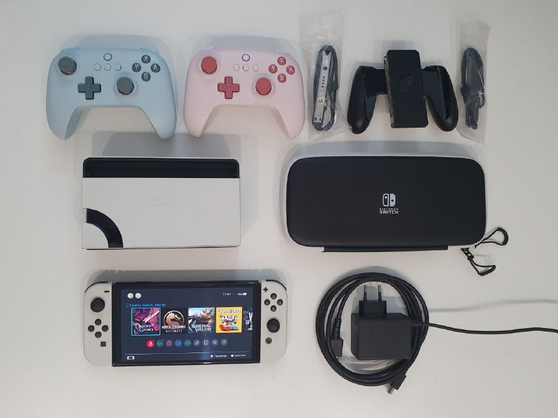 Nintendo Switch OLED комплект, 14 игр, 2 контроллера, кейс