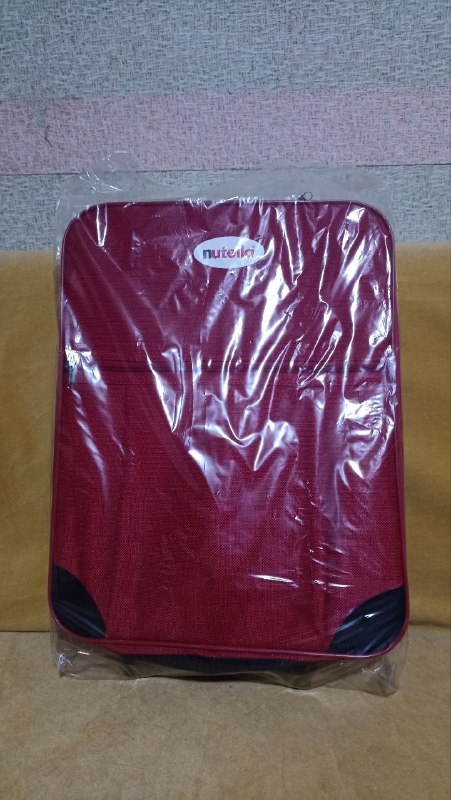 New red suitcase 51x36x15 2