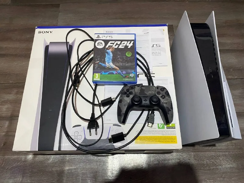 PlayStation 5 with disc drive, DualSense and FC 24 disc