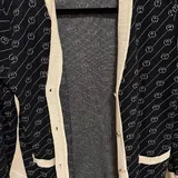 Шорты Just Cavalli, кроссовки Nike Air Force, бутсы Adidas, свитер Gucci 5