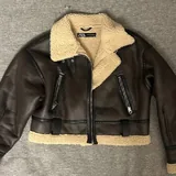 Весь набор одежды, сумки Miu Miu, куртки Balenciaga, сапоги 5