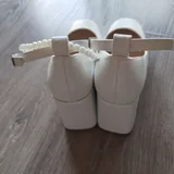 White dress, white shoes, black shoes 2