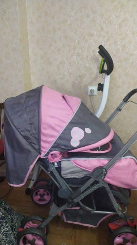 Коляска детская легкая с козырьком и фиксируемыми колесами