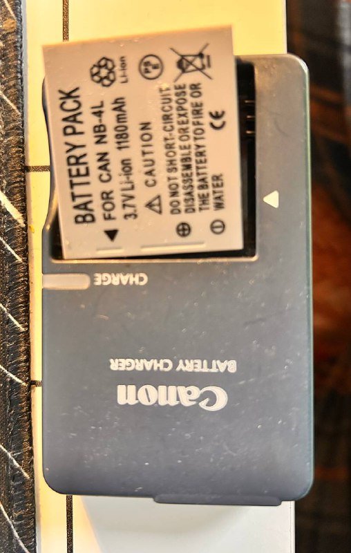 Зарядка и батарея Canon для фотоаппарата