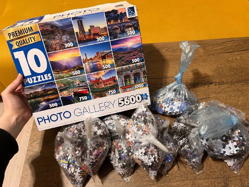 9 пазлов разных размеров в одной коробке