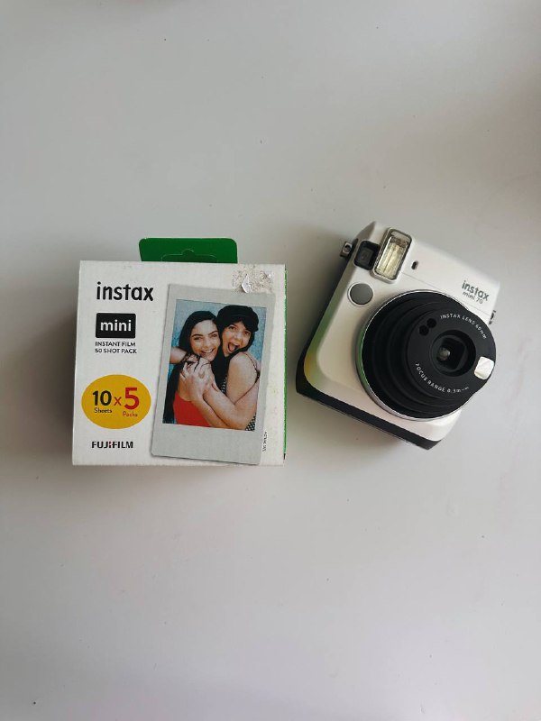 Instax Mini 70 фотоаппарат с тремя наборами картриджей и чехлом 3
