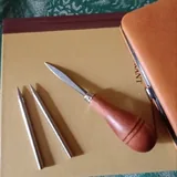 Книга и инструменты для плетения из кожи 3