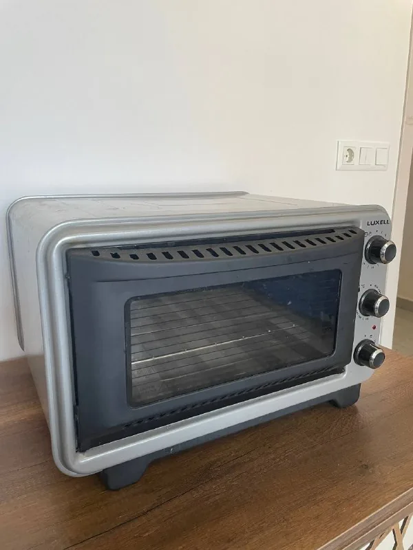 Электрическая духовка Luxell KF-3225 1