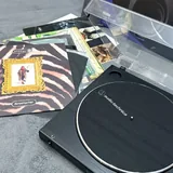 Проигрыватель Audio-Technica AT-LP60X, пластинки и колонки PreSonus Eris 3.5BT 1