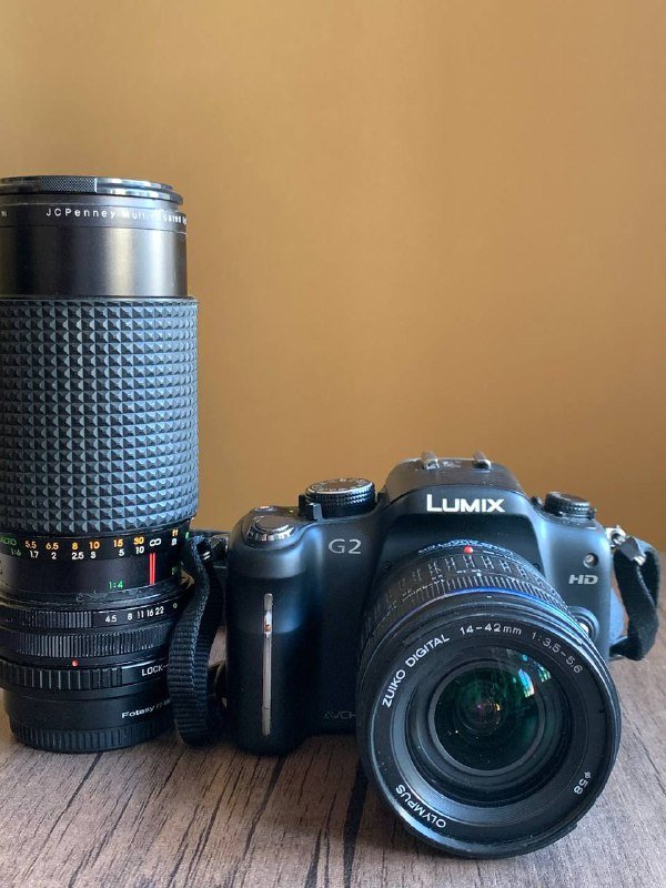 Пленочный фотоаппарат Minolta 7000AF с объективом и вспышкой, Цифровой фотоаппарат Panasonic LUMIX DMC-G2 с объективами и аксессуарами 5
