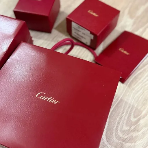 Коробки и пакеты Cartier