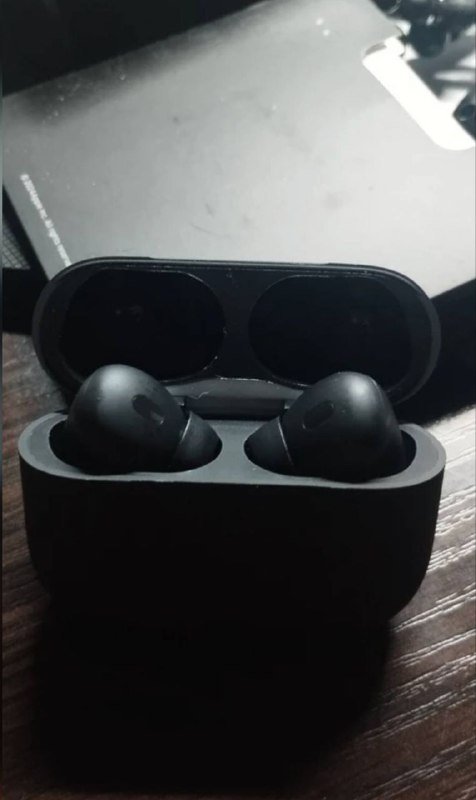 беспроводные наушники в зарядном кейсе