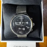 Samsung camera, Calvin Klein watch, Ray-Ban glasses, Kangol hat 3