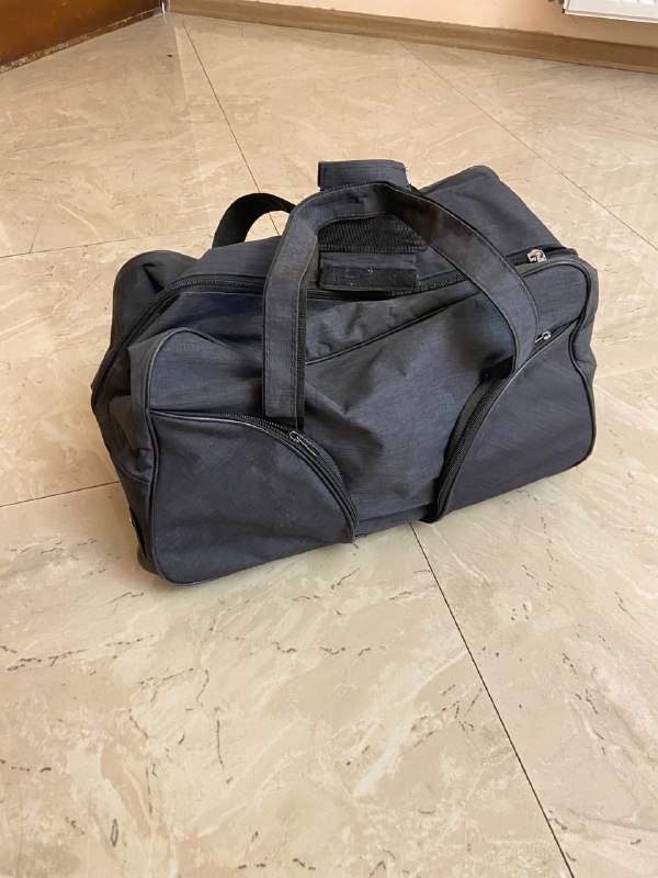 Дорожная сумка с ручкой и колесиками 3