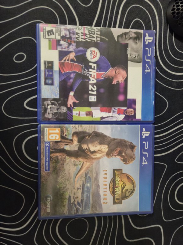PlayStation 4 with FIFA 21 and Jurassic World Evolution 2 8