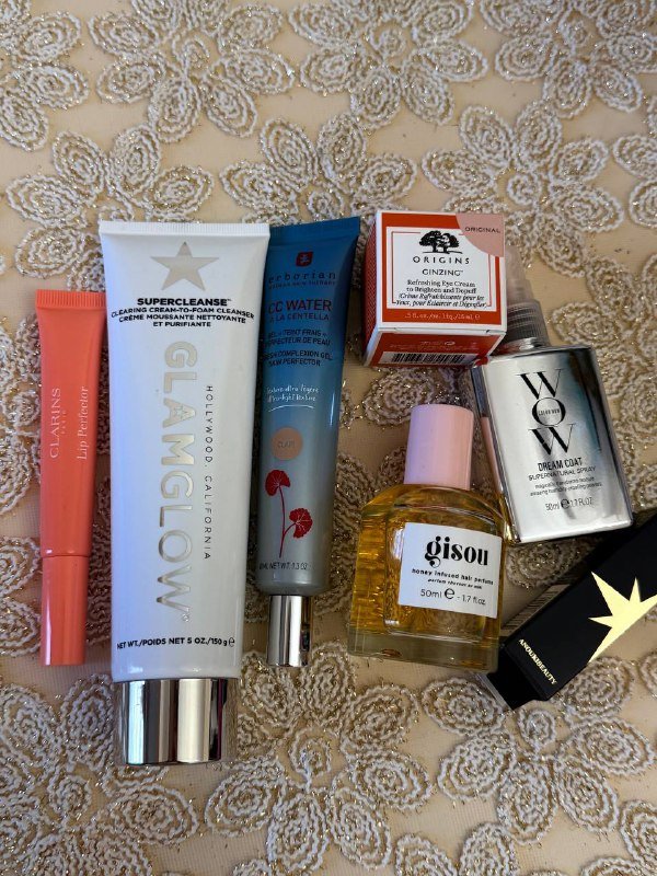 Clarins Lip Perfector, Glamglow Cleanser, CC Water, Origins Eye Cream, Wow Spray, Gisou Hair Perfume, Anouki Lipstick