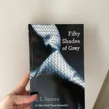 Носки Nike, фигурка Miniso, книга Fifty Shades of Grey 3