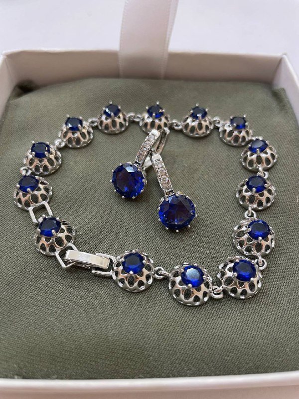 Браслет и серьги из стали с синими камнями