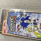 PSP с зарядкой, картой памяти и играми Sonic 2