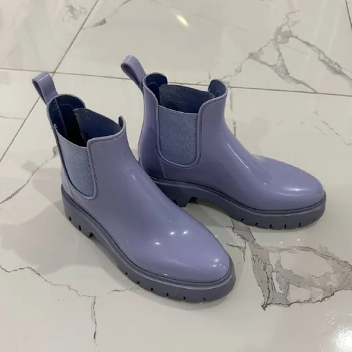 Lavender and green rubber boots