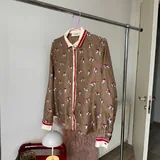 Джинсовая куртка Kenzo, шелковая рубашка MaxMara, рубашка Baroque, джинсы Heron Preston, джинсы Urban Outfitters 2