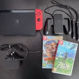 Nintendo Switch OLED с играми и аксессуарами 1