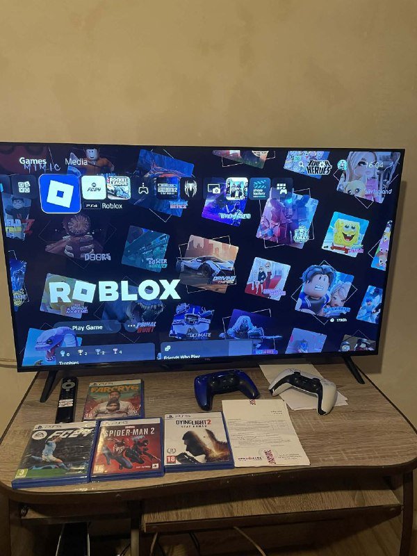 Игровая приставка PlayStation 5 с играми и телевизором 2