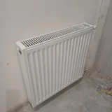 Стальные белые радиаторы отопления 60 и 120 см 1