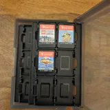 Nintendo Switch Lite, холдер для картриджей, 3 игры 2